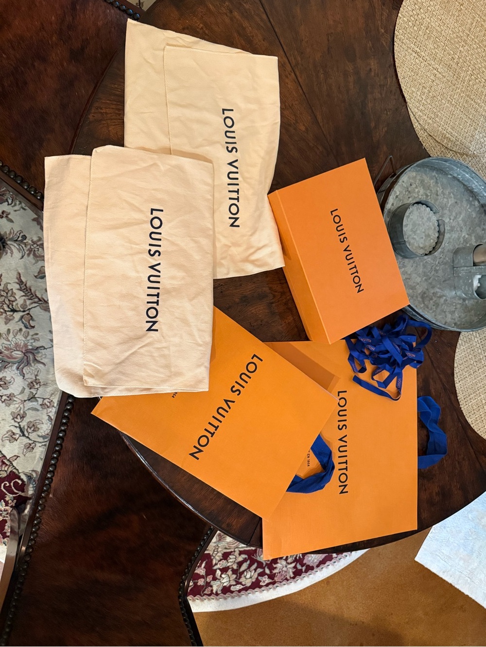 Louis Vuitton Orange Shopping Bags and Beige Dust Covers